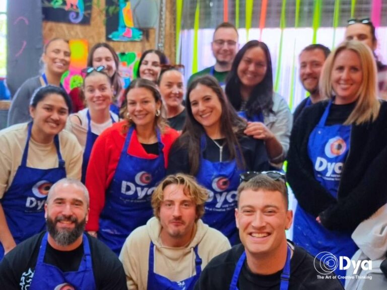 Two Hands-On Programs to Close the Year Creatively All-in-One: Picasso Mural This collaborative painting workshop invites each participant to paint one part of a larger mural. When combined, the canvases reveal a bold, Picasso-inspired group artwork, symbolising teamwork, shared vision, and collective creativity. It's ideal for reinforcing connection, problem-solving and co-creation, making it perfect for teams who want to reflect on their journey together and celebrate what they’ve built as one. Play with Clay In this tactile, relaxing workshop, team members work with clay to create a sculptural or functional piece, no prior experience required. The session encourages mindfulness, creative risk-taking, and hands-on engagement, offering a refreshing break from the screen and a calming way to close a fast-paced year. It’s ideal for teams looking to recharge, connect through creativity, and start the new year with renewed focus. Tips for a Meaningful End-of-Year Team Activity To make your end-of-year activity more impactful, consider these tips: Start with purpose: Be clear about what you want the experience to achieve: connection, creativity, reflection, or all three. Make it inclusive: Choose an activity that works for all personalities and experience levels. Create space for reflection: Even a short conversation at the end of the session can deepen learning and connection. Celebrate the outcome: Display the team’s artwork or creations back at work to keep the experience alive. Carry it forward: Reference the activity in your January team meetings as a reminder of what’s possible when you create together. End the Year with Purpose, Start the Next with Momentum Your team deserves more than just a celebration. A creative, hands-on experience like Picasso Mural or Play with Clay can help them reconnect, reset, and move into the new year with energy and confidence. Dya Australia’s corporate workshops make it easy to create a memorable end-of-year event that strengthens team morale and builds lasting value. Explore both programs and book your team’s experience today.