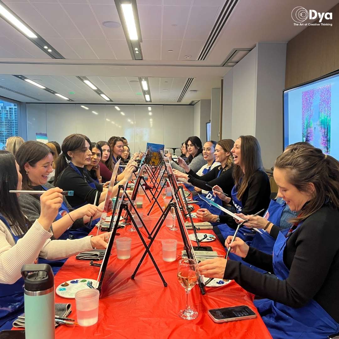 Corporate team developing soft skills in the workplace through a creative workshop