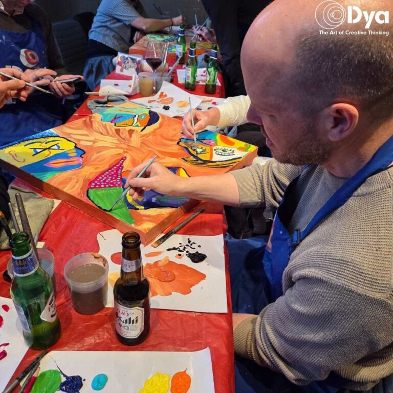 Team developing workplace collaboration skills through a creative workshop