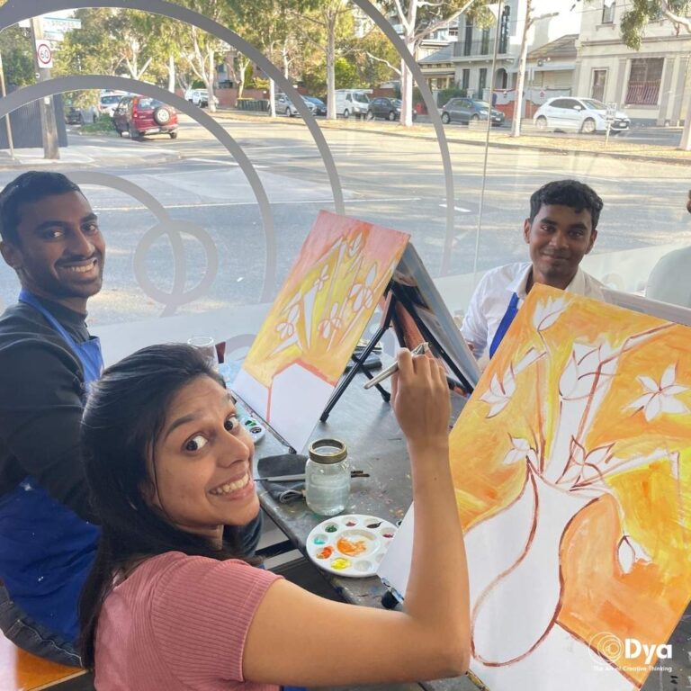 Team participating in an out-of-the-box creative team building workshop in Melbourne